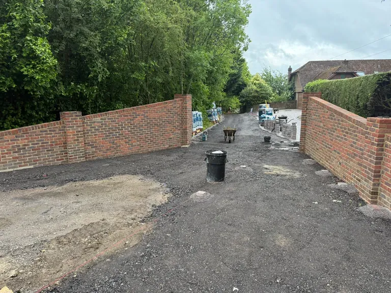 Block paving driveway preparation with brick walls in Kent